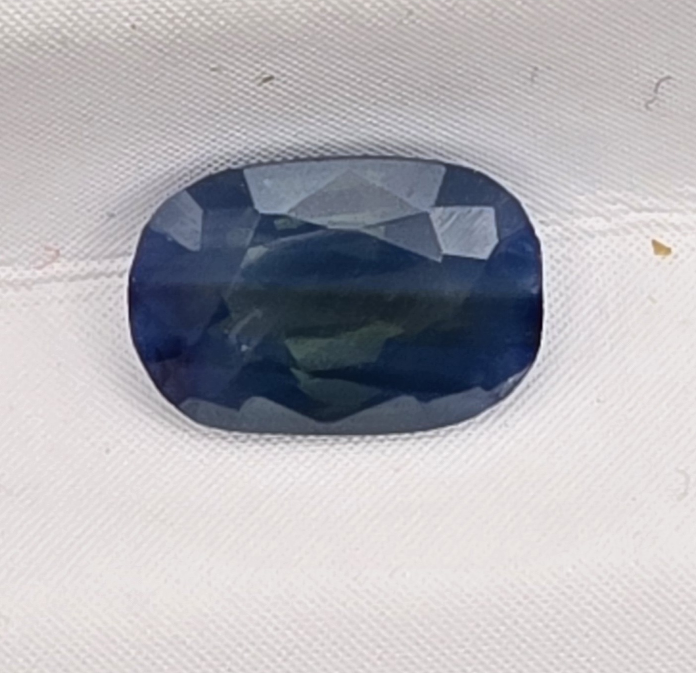 6.64x4.51x3.06mm cushion Australian sapphire facet