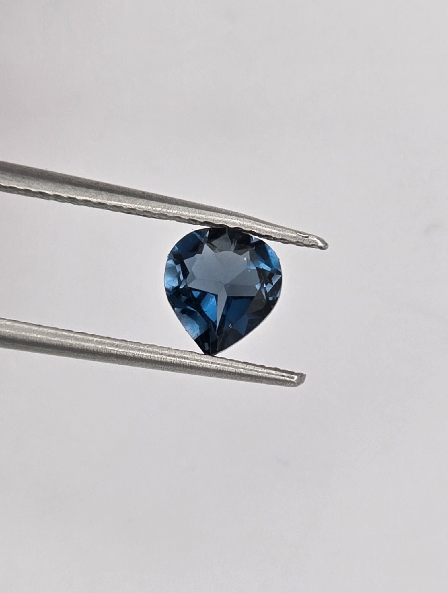 6.63x6.12x3.23mm pear London-blue topaz facet