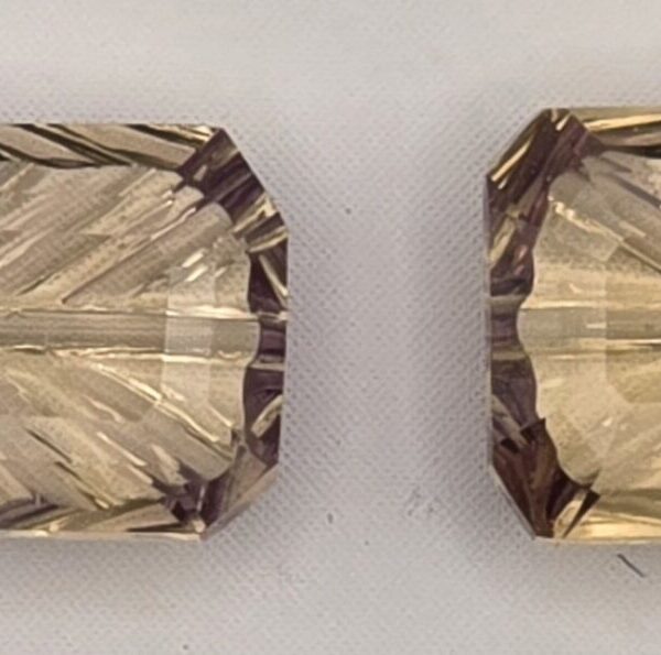 12.48x6.88x3.73mm & 12.49x6.43x3.81mm pair of fantasy-cut, high quality ametrine facets