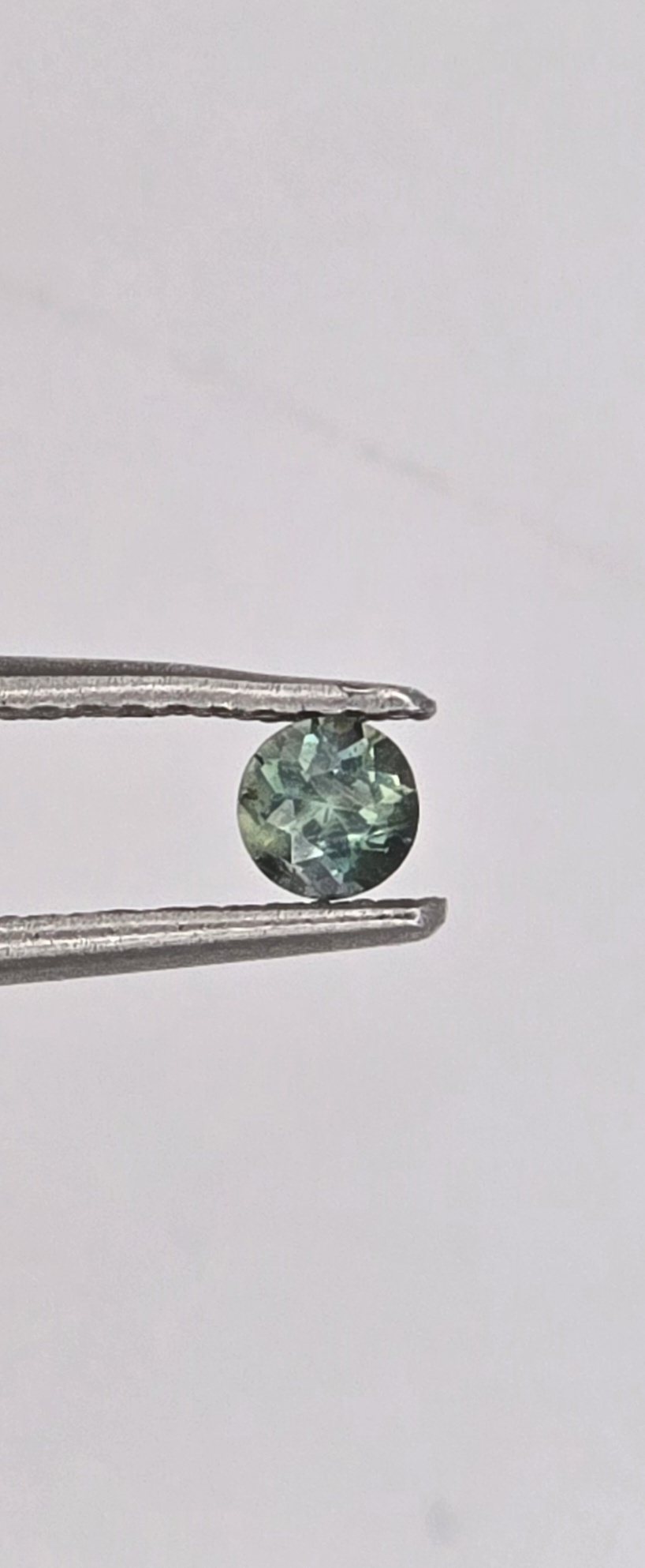 3.30x3.28x2.33mm round Australian sapphire facet