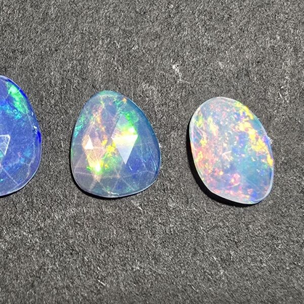 FOUR rose-cut Ethiopian opal cabochons