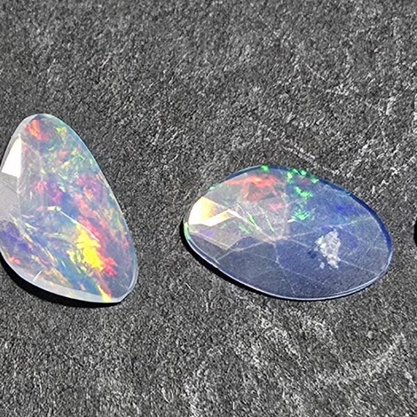 FOUR rose-cut Ethiopian opal cabochons