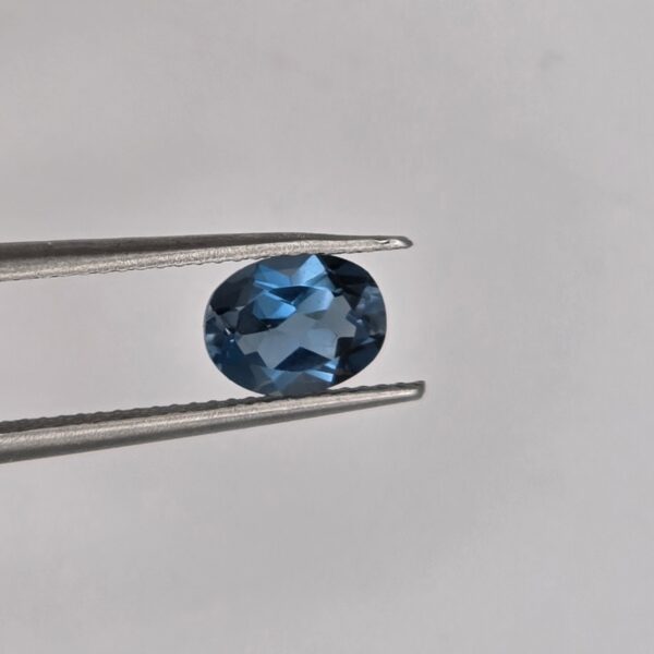 7.69x5.87x3.68mm oval London-blue topaz facet