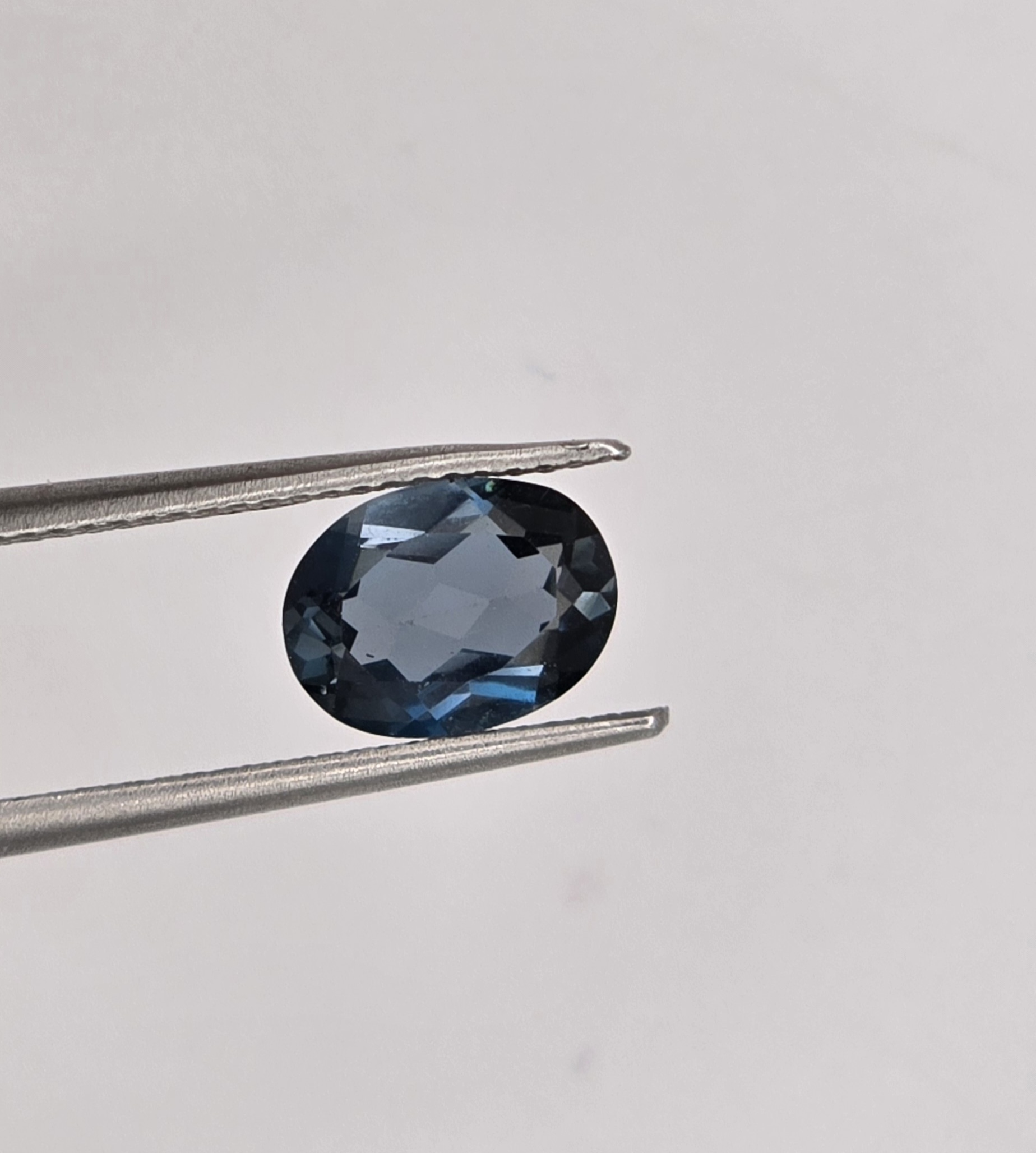 8.84x6.66x3.72mm oval London-blue topaz facet