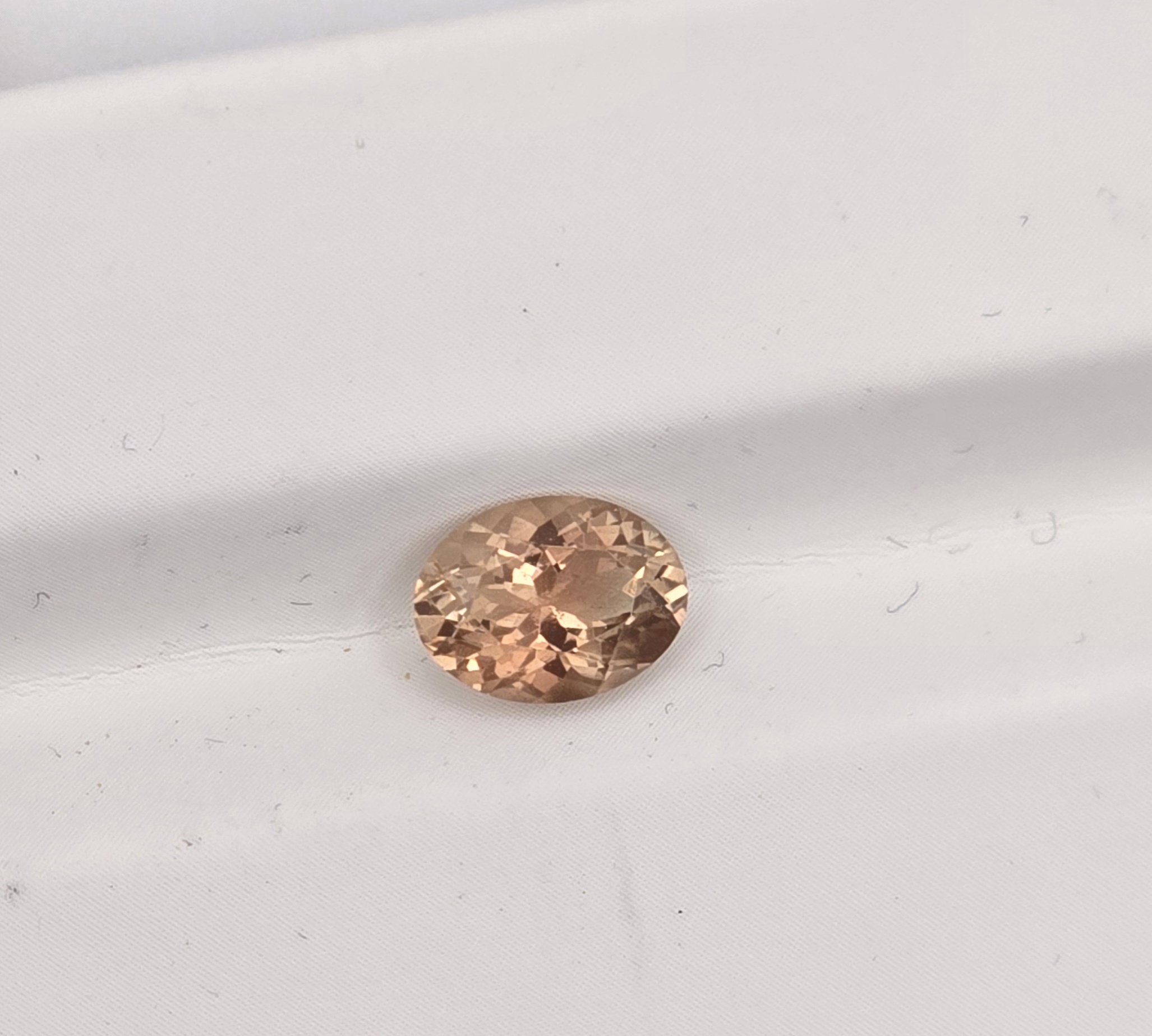 8x6mm oval sunstone facet