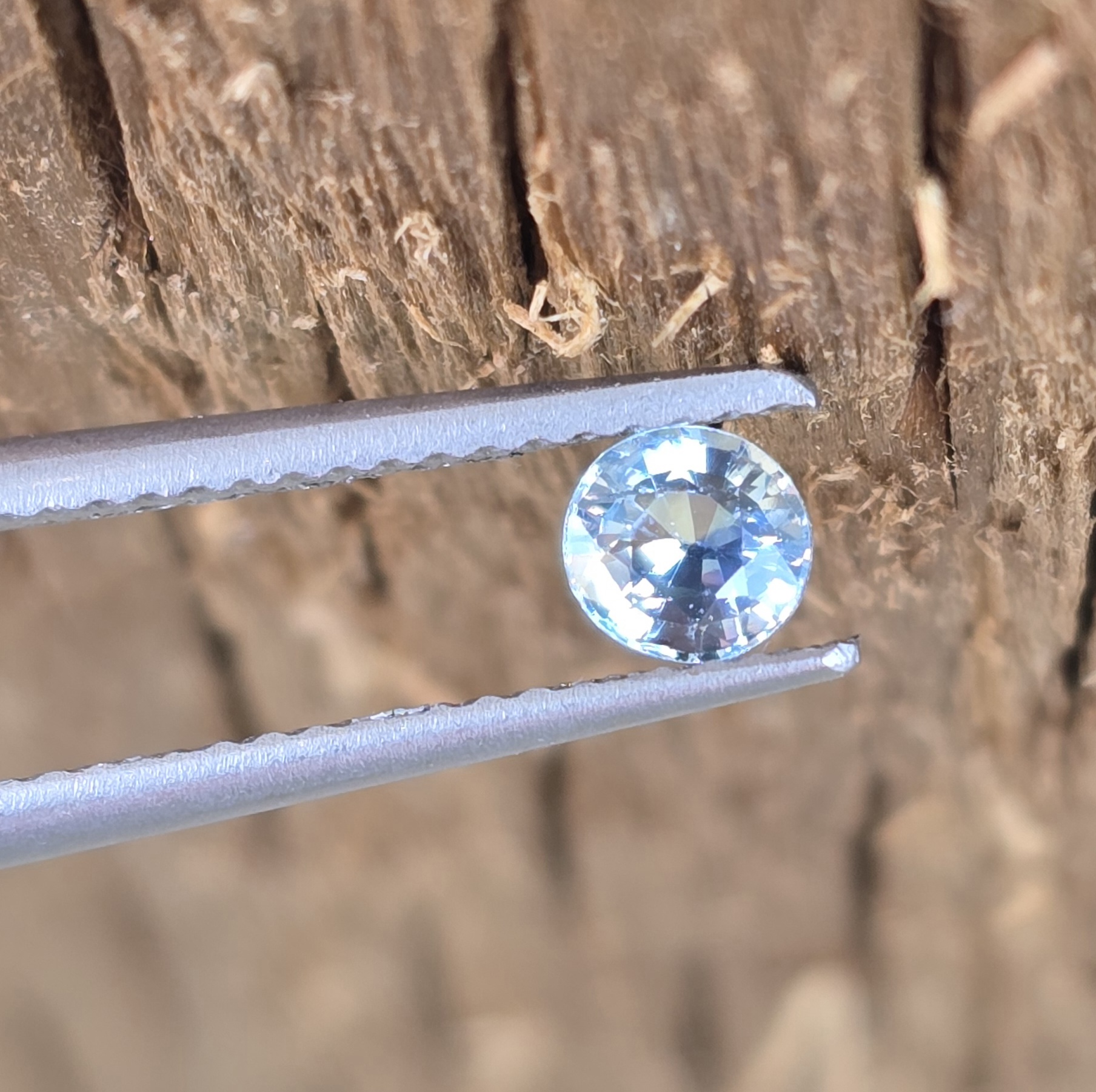4.03x3.80x2.59mm natural round-ish Australian light blue sapphire facet
