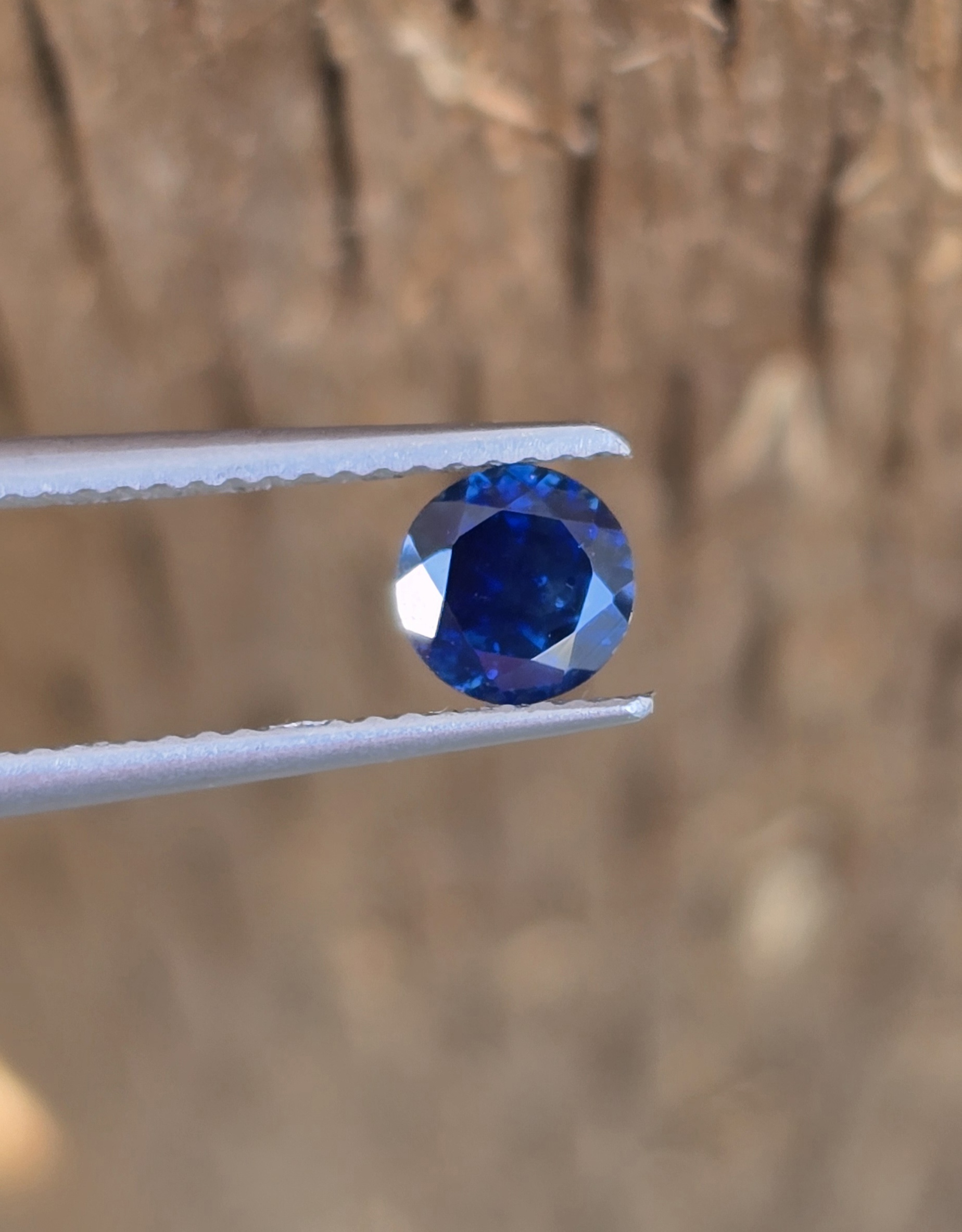 5.24x5.16x3.31mm natural round Australian deep blue sapphire facet